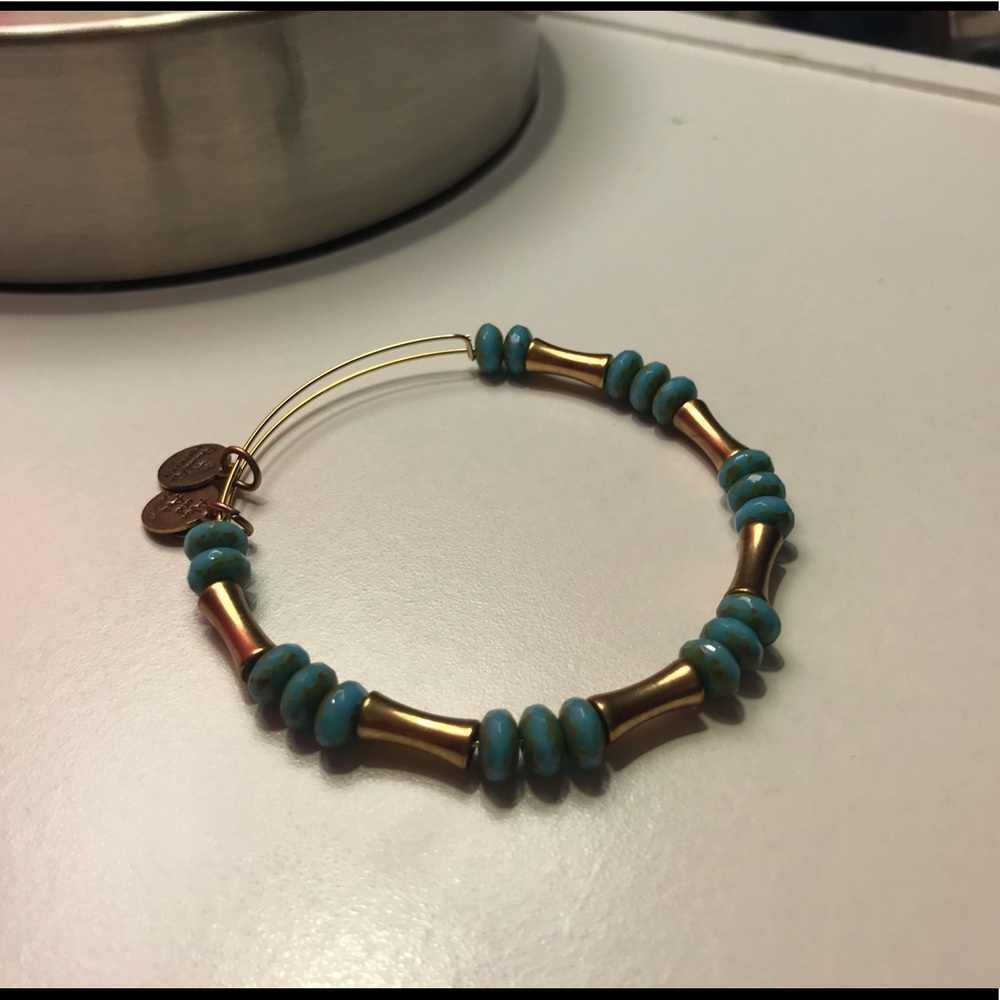 Gold Alex and Ani with blue beads